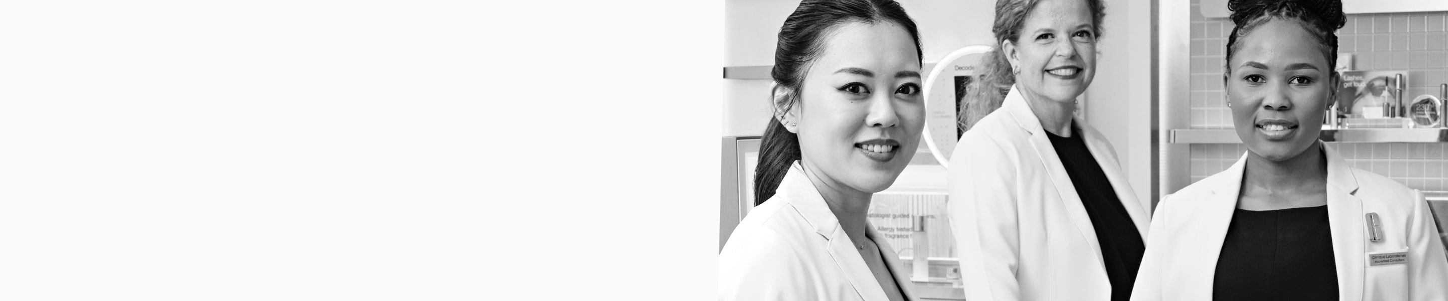 black and white photo of consultants in white coat